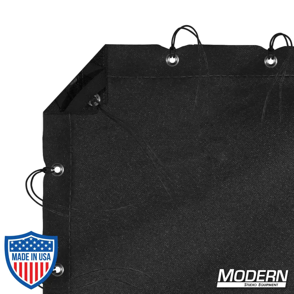 Black waterproof textile with grommets and ties for film grip rigging, includes elastic corners and storage bag from Modern Studio Equipment