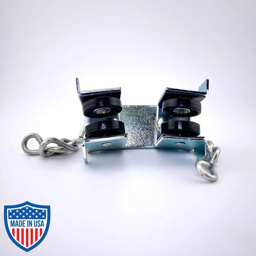 Curtain Track Master Carrier with Delrin wheel assemblies, swivel hooks, and chains for film grip and rigging on backdrop.