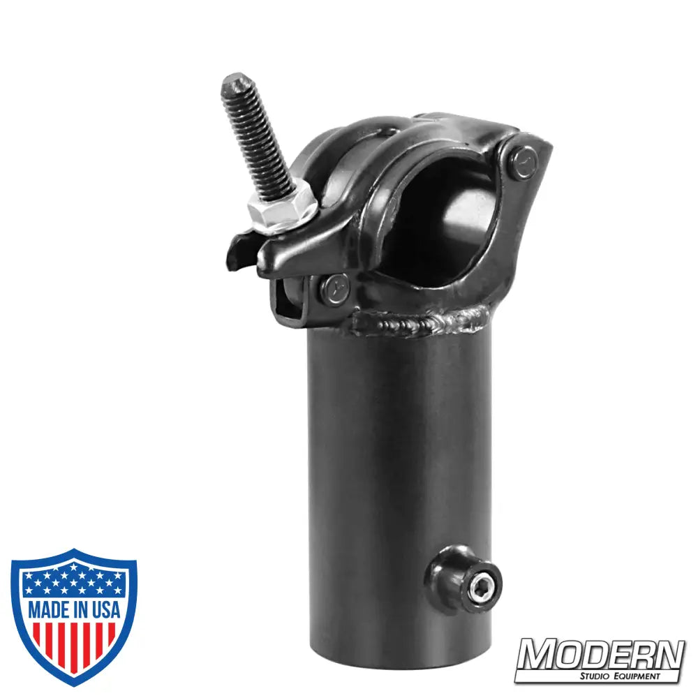 Steel grid clamp with vertical 1-1/2-inch Speed-Rail® receiver in black zinc with nut for film grip rigging.