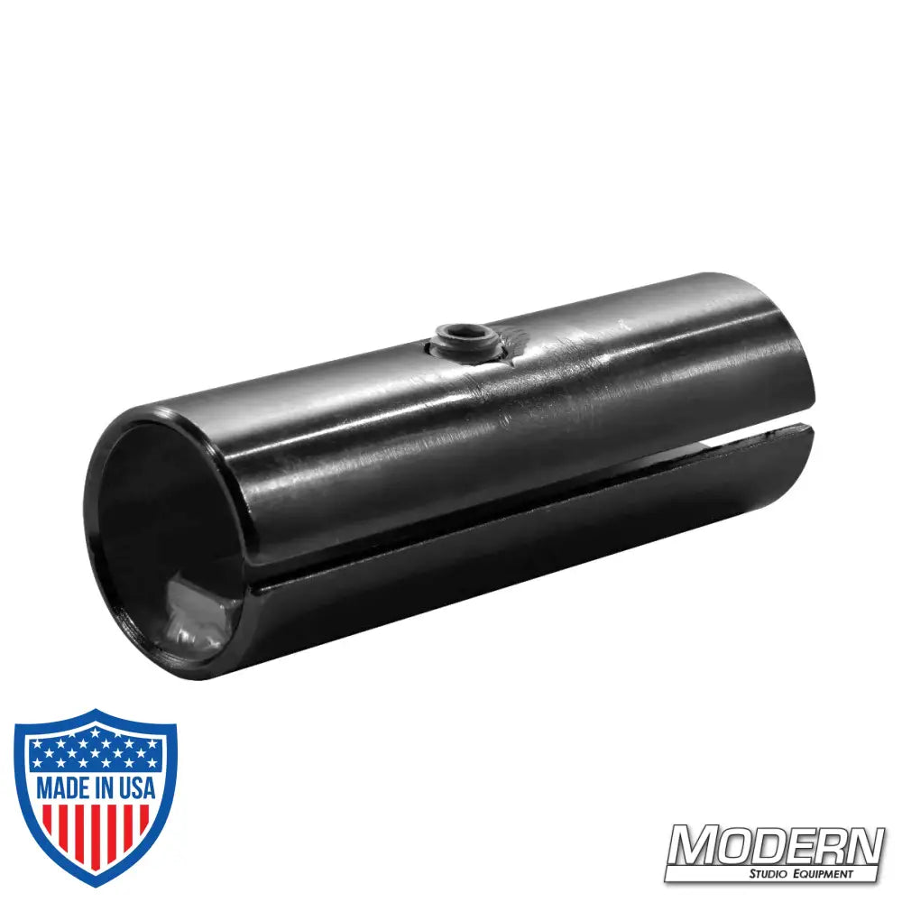 Internal track connector for 1-1/4 inch Speed-Rail® in black zinc, used in film grip rigging.