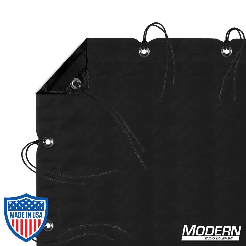 Solid black slip cover with webbing, grommets, ties, and elastic on all sides. Comes with storage bag. Film grip rigging equipment.