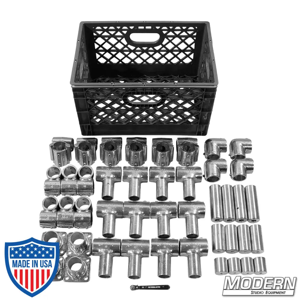 Speed-Rail® On-The-Go rigging kit with 4 elbow fittings, 6 short barrel crosses, 12 swivels, 4 floor flanges, and a low profile wrench in a milk crate.