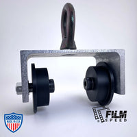 4" I-Beam Cable Roller for film grip and rigging, fits 4" wide beams, used to roll cable on bottom lip with an eye-bolt attachment.