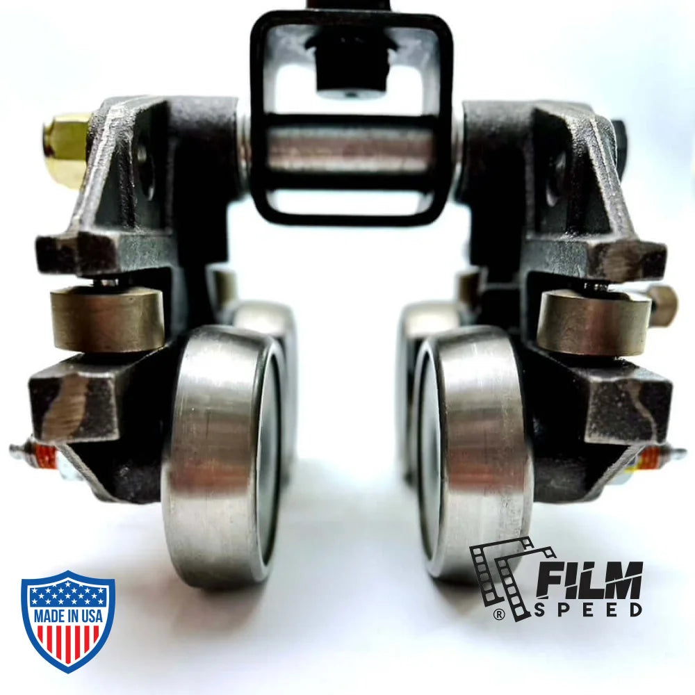 Heavy duty beam trolley for film grip and rigging, with durable steel wheels and robust construction for studio or on-set use