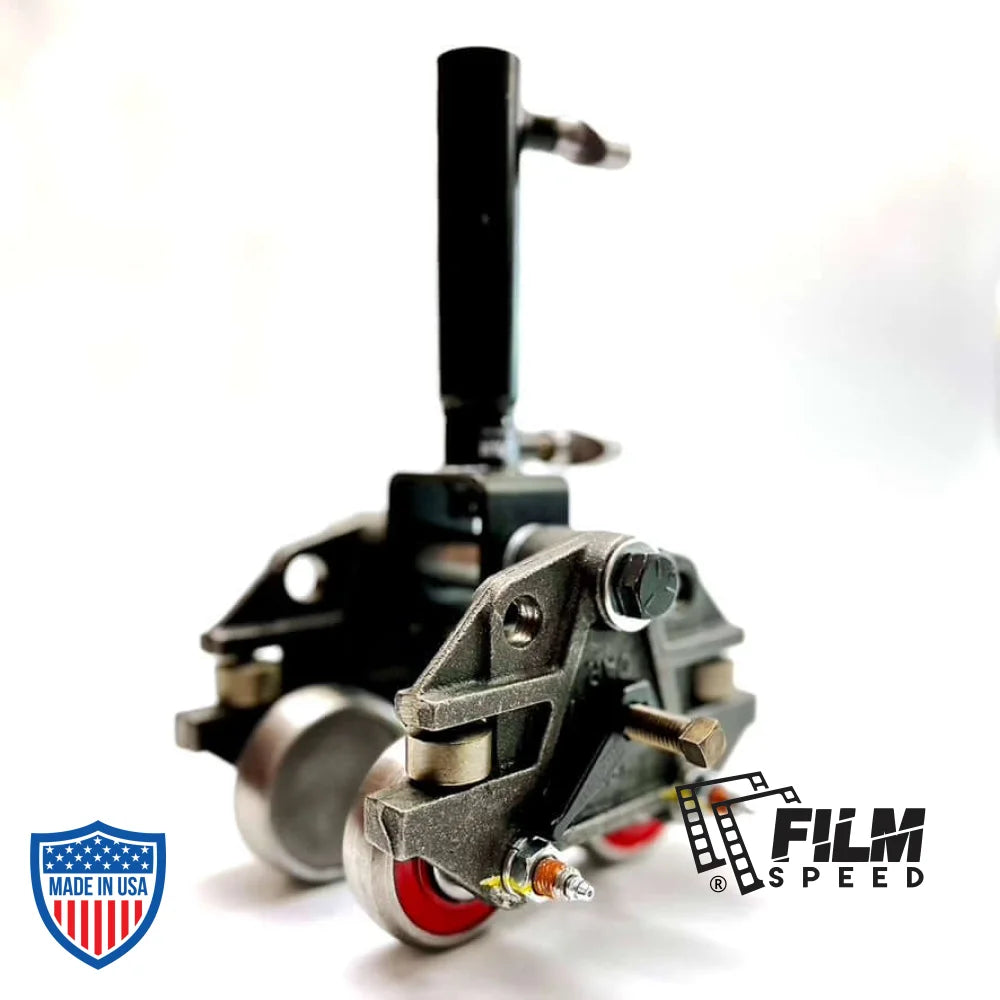 Heavy duty beam trolley for film grip and rigging with red wheels and black handle.