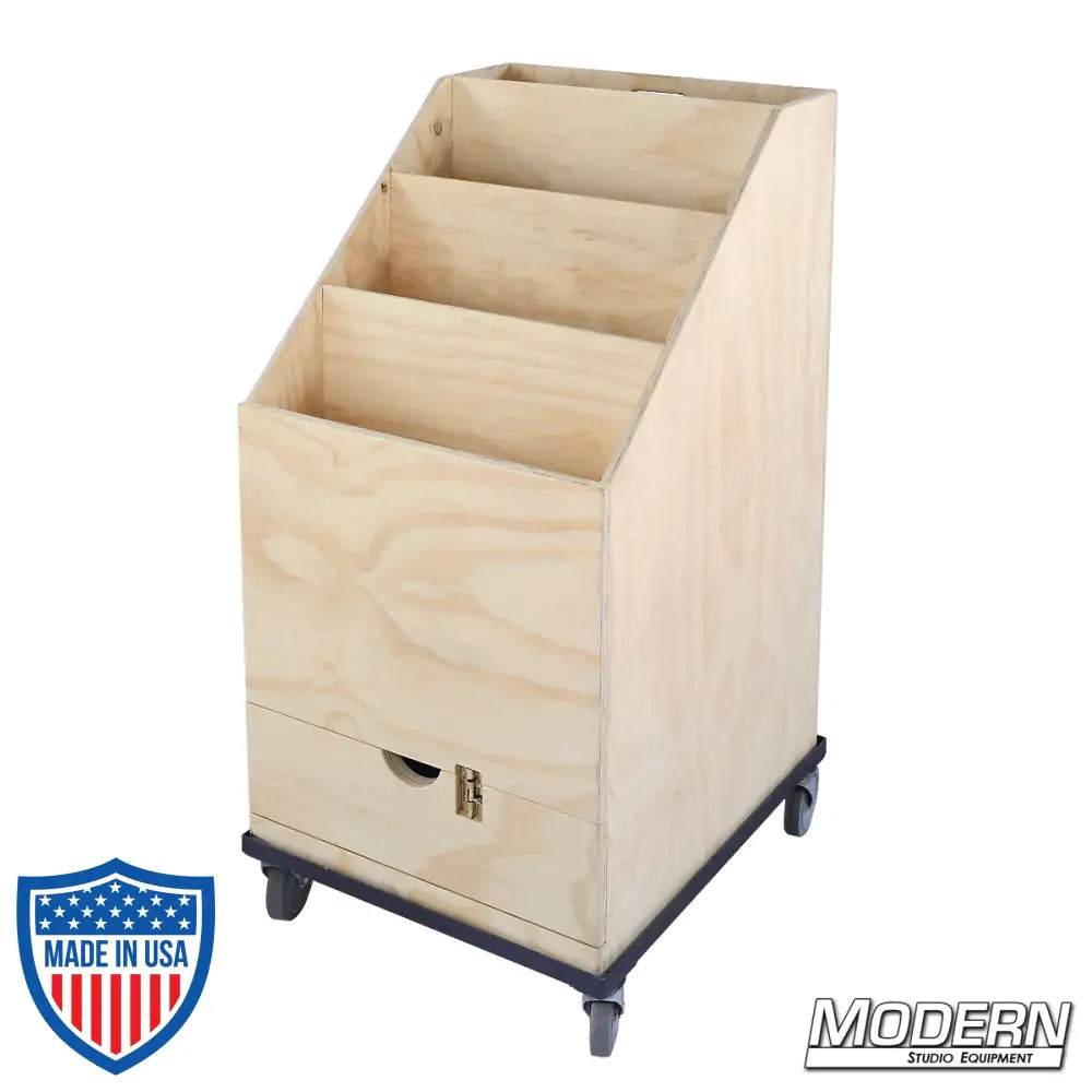 Wooden 3-place scrim and flag box with drawer on casters for film grip and rigging equipment storage.