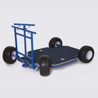 Western Dolly with push bar, pull handle, and pop-off wheels for film grip and rigging.