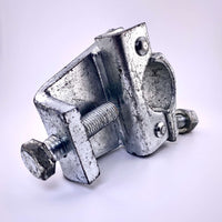 Fixed SK Gravlok Clamp for securing 1 1/4"-1 1/2" pipes to steel beams, ideal for film grip and rigging applications.