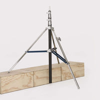 American Baby 2-Rise R/M Leg, 3/4-inch x 30-inch, film grip rigging stand on wooden blocks, footprint 45 inches, max height 9'4", weight 10.75 lbs