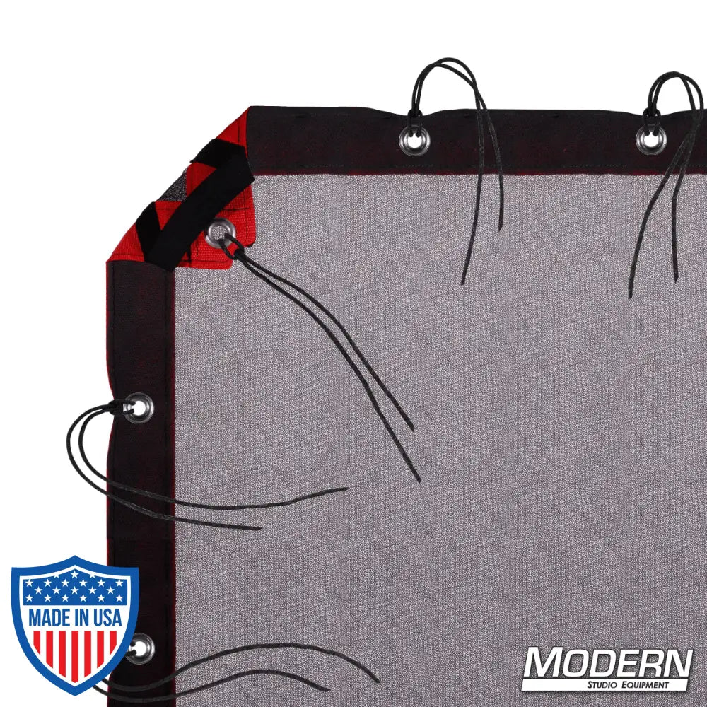 Black Double Scrim with grommets, webbing, and elastic corners for film grip rigging, includes storage bag, reduces light without altering color.