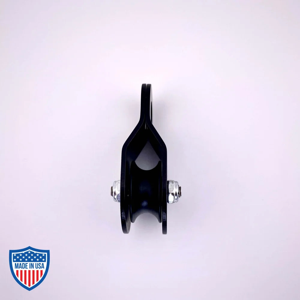 Black Film Micro Pulley CMI RP142 with anodized aluminum sideplates and nylon sheave for film grip rigging.