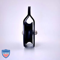 Black Film Pulley CMI RP101FS with anodized aluminum sideplates, ideal for film grip and rigging, shown against a white background.