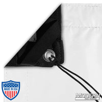 Black/white poly bounce fabric with webbing, grommets, and ties, ideal for film and grip rigging. Durable and non-flame retardant material.