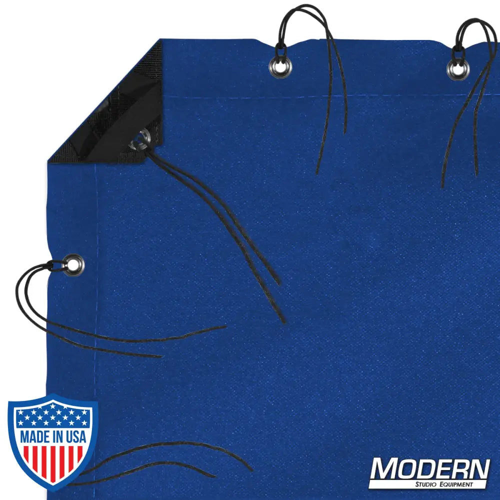 Blue waterproof textile with grommets, ties, and elastic corners for film grip and rigging, includes labeled storage bag.