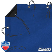 Blue waterproof textile with grommets, ties, and elastic corners for film grip and rigging, includes labeled storage bag.