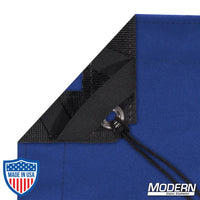 Blue waterproof textile for film grip and rigging, featuring webbing, grommets, ties, elastic corners, and a storage bag.