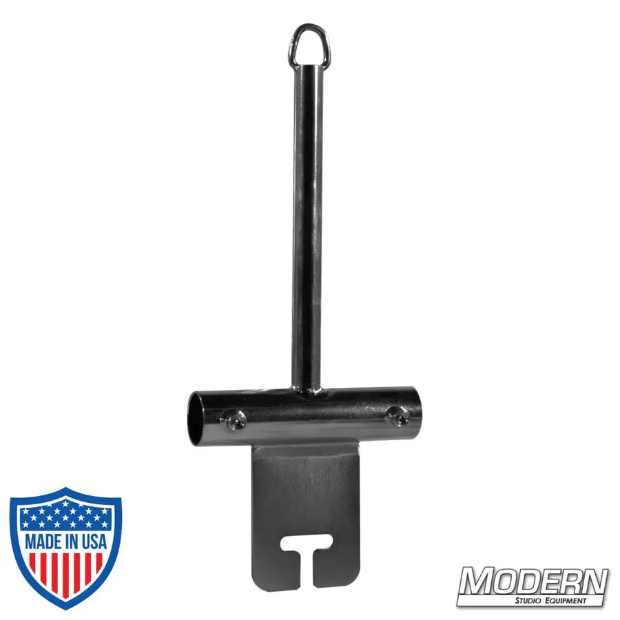 Center boom post with ear for 1-1/4-inch Speed-Rail® in black zinc finish used in film grip and rigging setups.