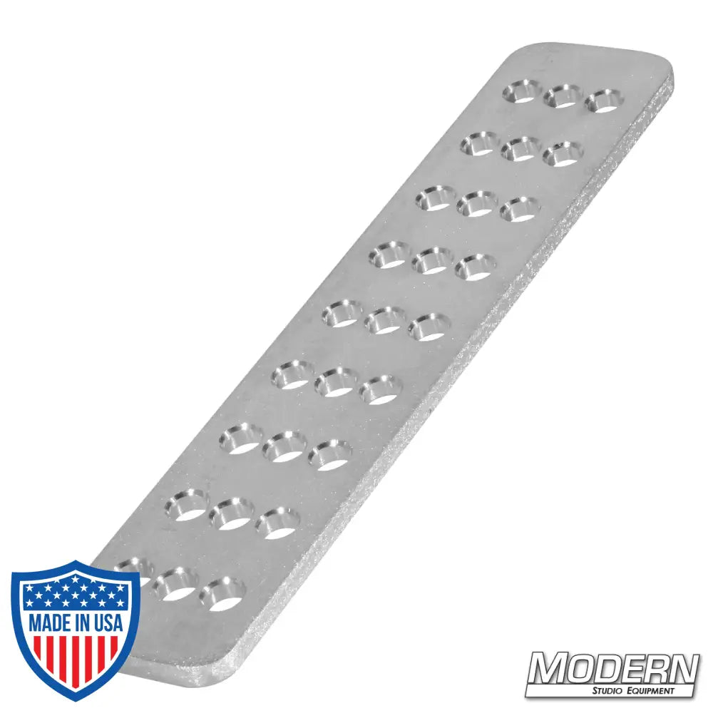 Aluminum cheese plate measuring 2" x 10" x 1/4", ideal for film grip and rigging applications in modern studio equipment.