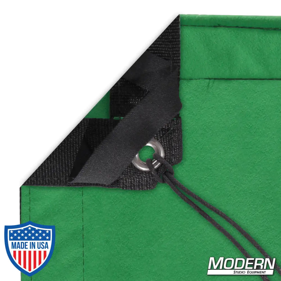 Chromakey Green Screen corner with webbing, grommet, elastic tie, and Modern Studio Equipment logo for film grip and rigging.