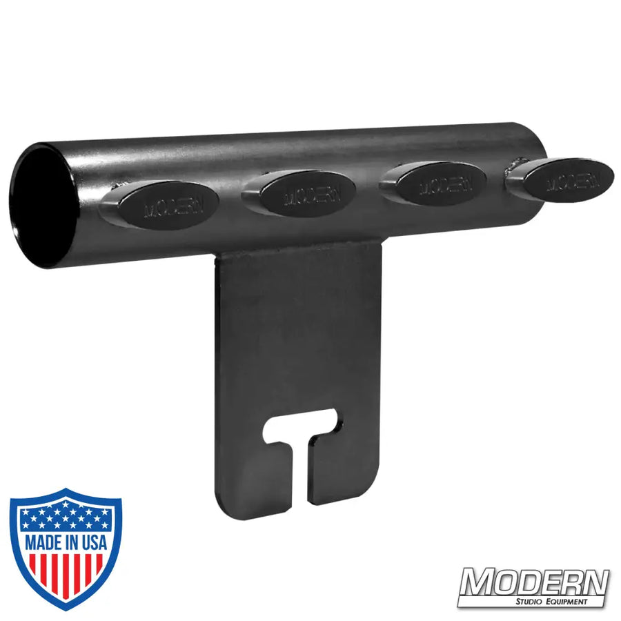 Black zinc adapter for attaching 1-1/2" Speed-Rail to grip head in film rigging setups, featuring T-handles for secure connection