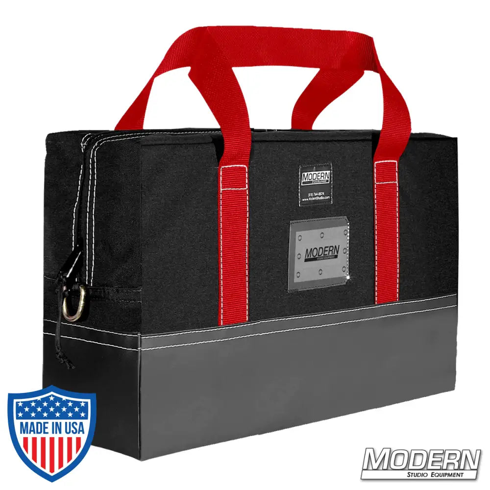 Durable 12" x 18" Flag Bag with red handles for film grip and rigging, made of Cordura fabric and lined with Coroplast for protection and stiffness