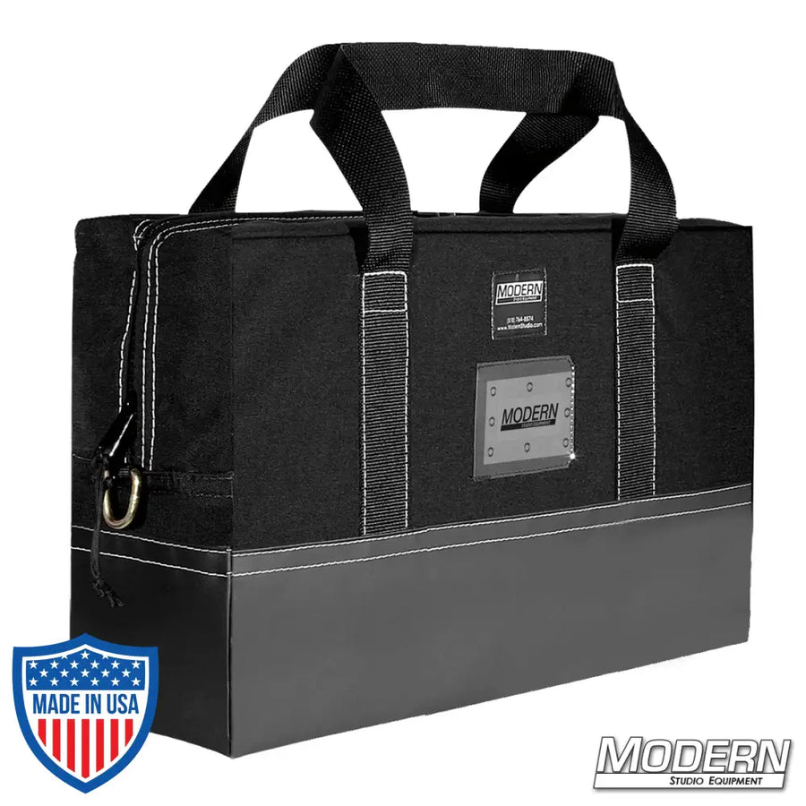 Durable 12" x 18" Cordura Flag Bag with heavy duty zippered closure, carrying handles, and vinyl bottom for film, grip, and rigging equipment.