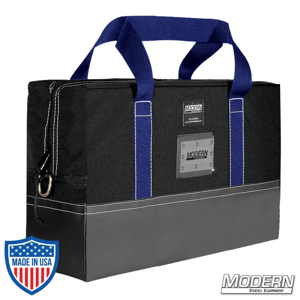 Flag Bag - 12" x 18" Cordura fabric carrying bag with blue handles and zippered closure for storing film grip and rigging equipment.