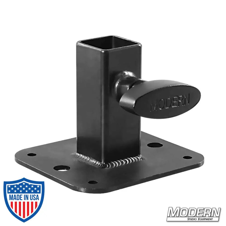 Flange base for 1-inch square tube in black zinc with T-handle for film grip rigging.