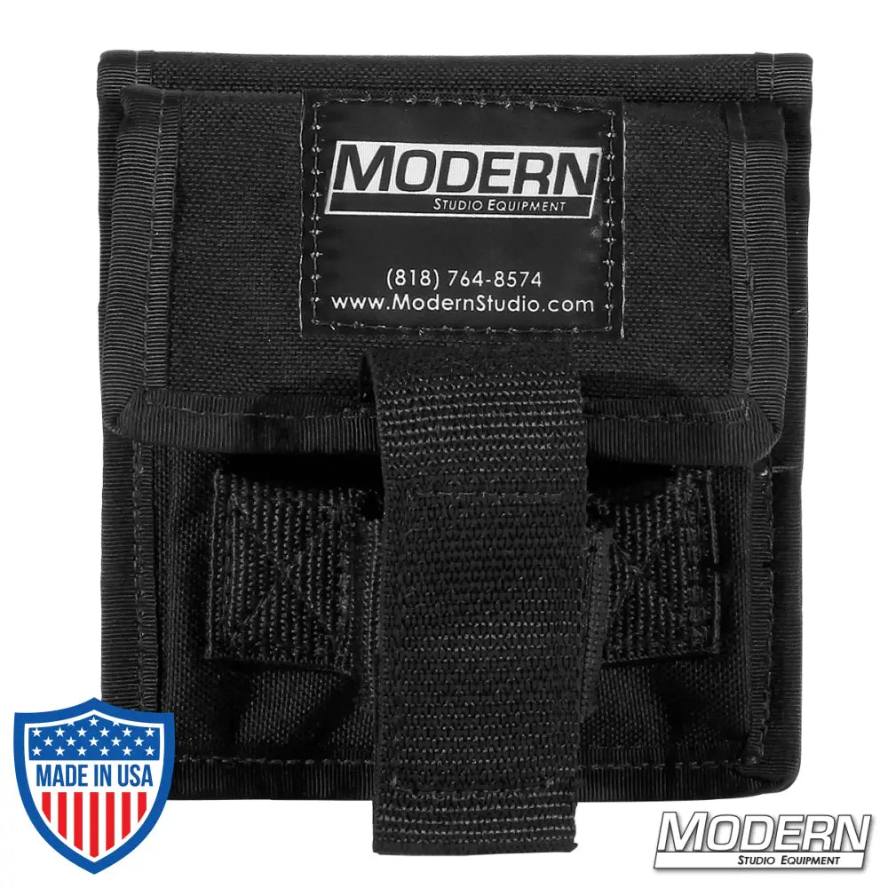 Hammer and nail holder with Velcro safety strap for film rigging, black cordura.
