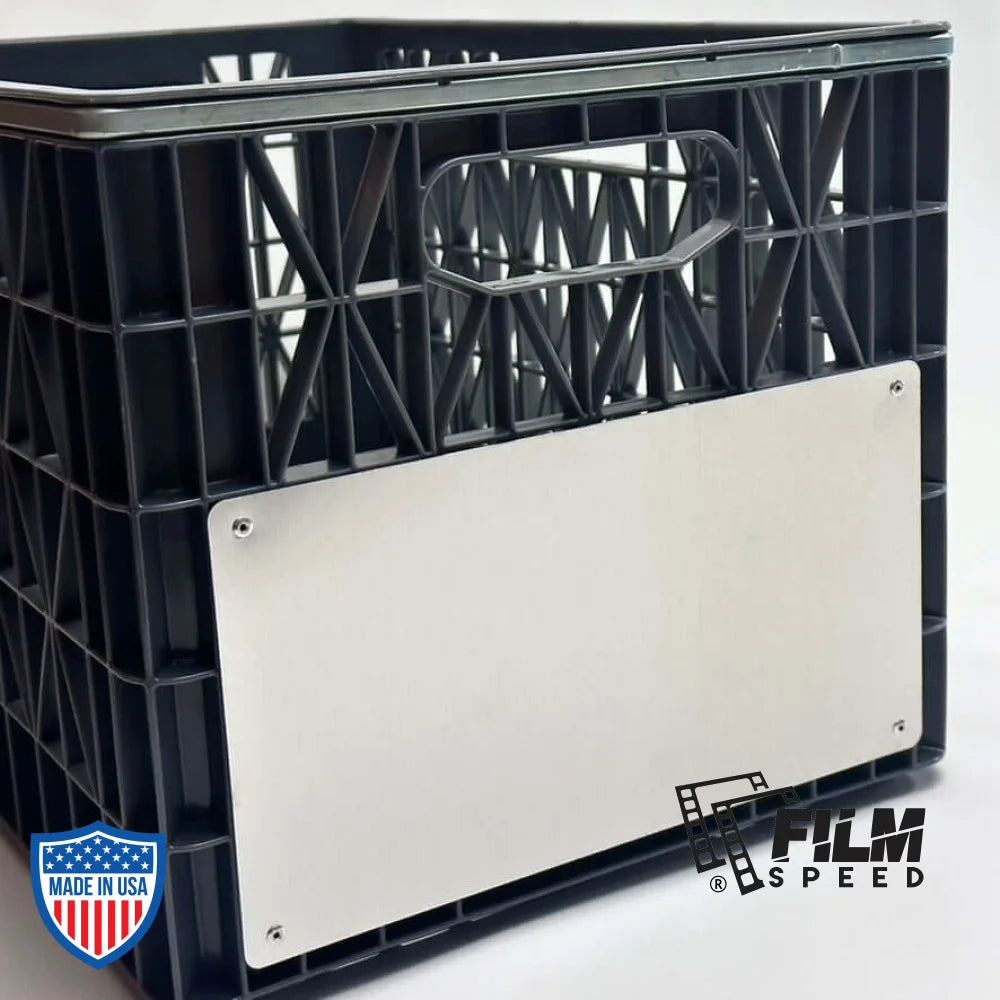 Heavy duty milk crate with attached aluminum Crate Slate for labeling in film grip and rigging setups