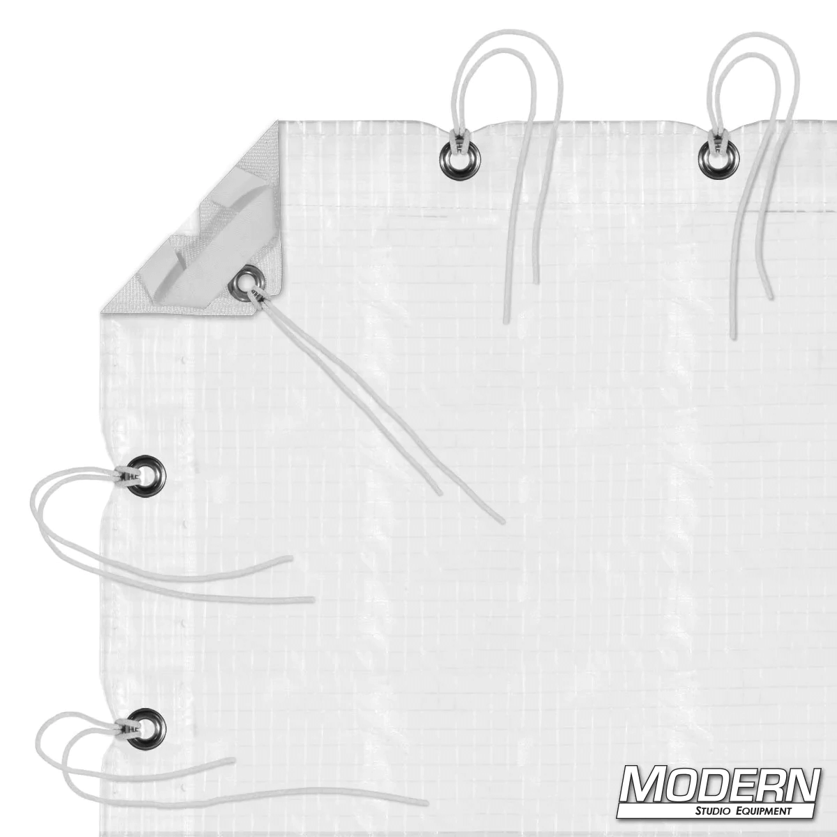 Clear Poly Bounce (Griffolyn) with grommets and webbing, durable for outdoor use in film rigging and grip applications