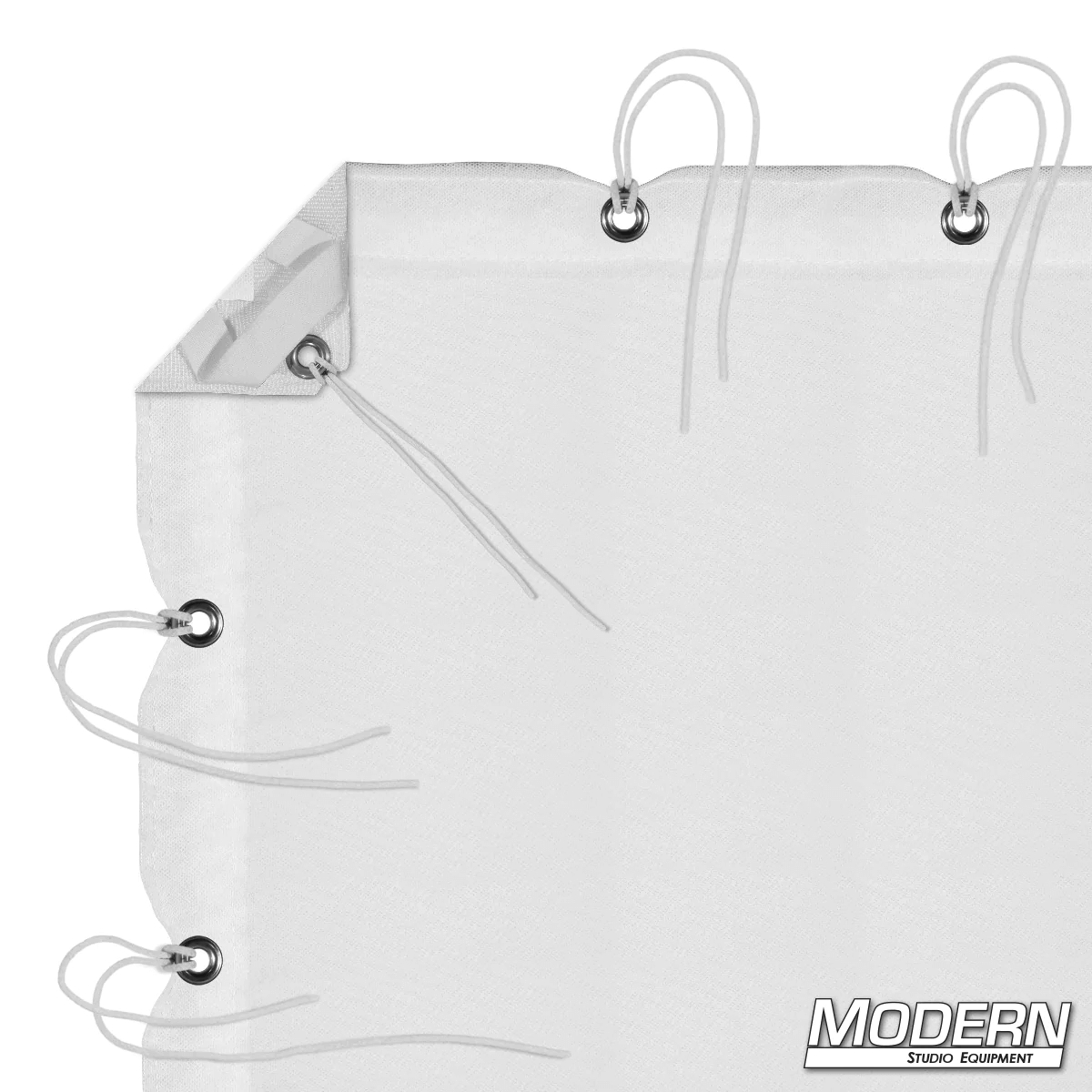 White Double Scrim with grommets and ties for film grip rigging, includes storage bag.