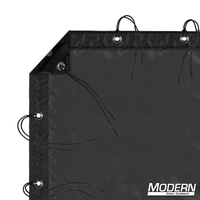 Black artificial silk with webbing, grommets, ties, elastic corners and included storage bag for film grip and rigging on frames.