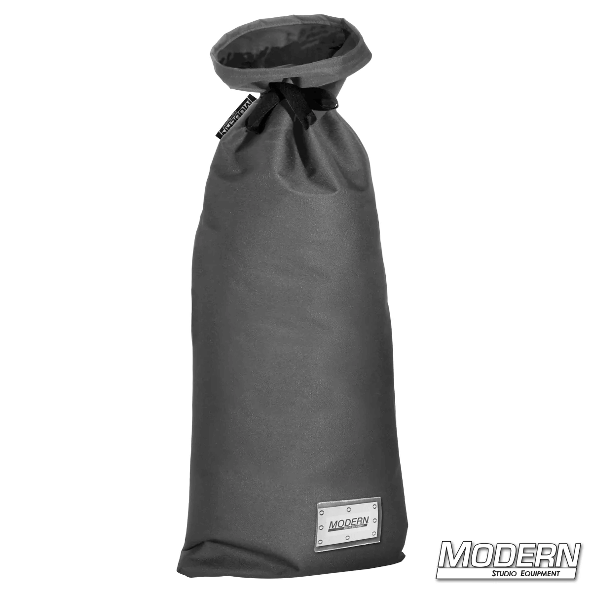 Large grey storage bag with nylon cord and plastic sleeve, used for film grip and rigging, by Modern Studio Equipment.