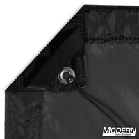 Corner view of Black Artificial Silk with grommet and tie, ideal for film grip and rigging, includes storage bag.