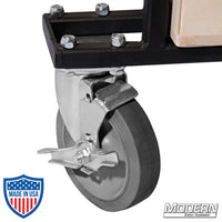 Close-up of front swivel caster with locking brake on Large Grip Cart for film grip and rigging equipment.