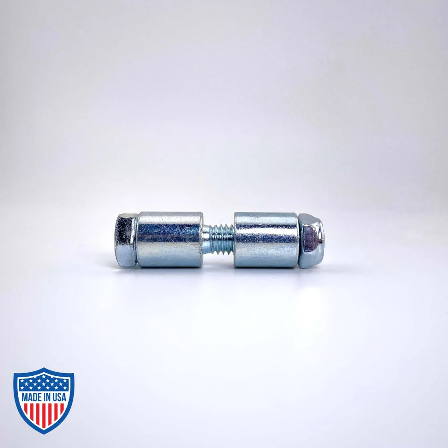 Curtain track end stop for film grip rigging prevents backdrops from falling off the end of a track.