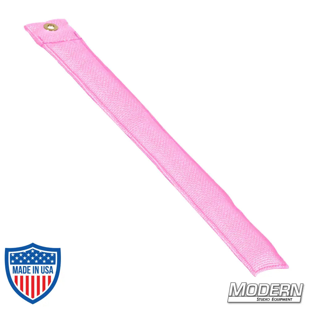 12-inch pink Modern marker made of durable Cordura 1000 for film grip and rigging, designed to stay in position on any surface.