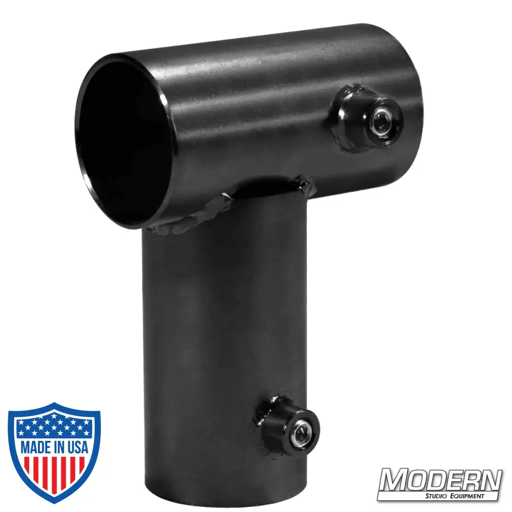 Black zinc Mini Corner for 1-1/2-inch Speed-Rail® with set screws, used for film grip rigging to create a 90° corner on aluminum frames.