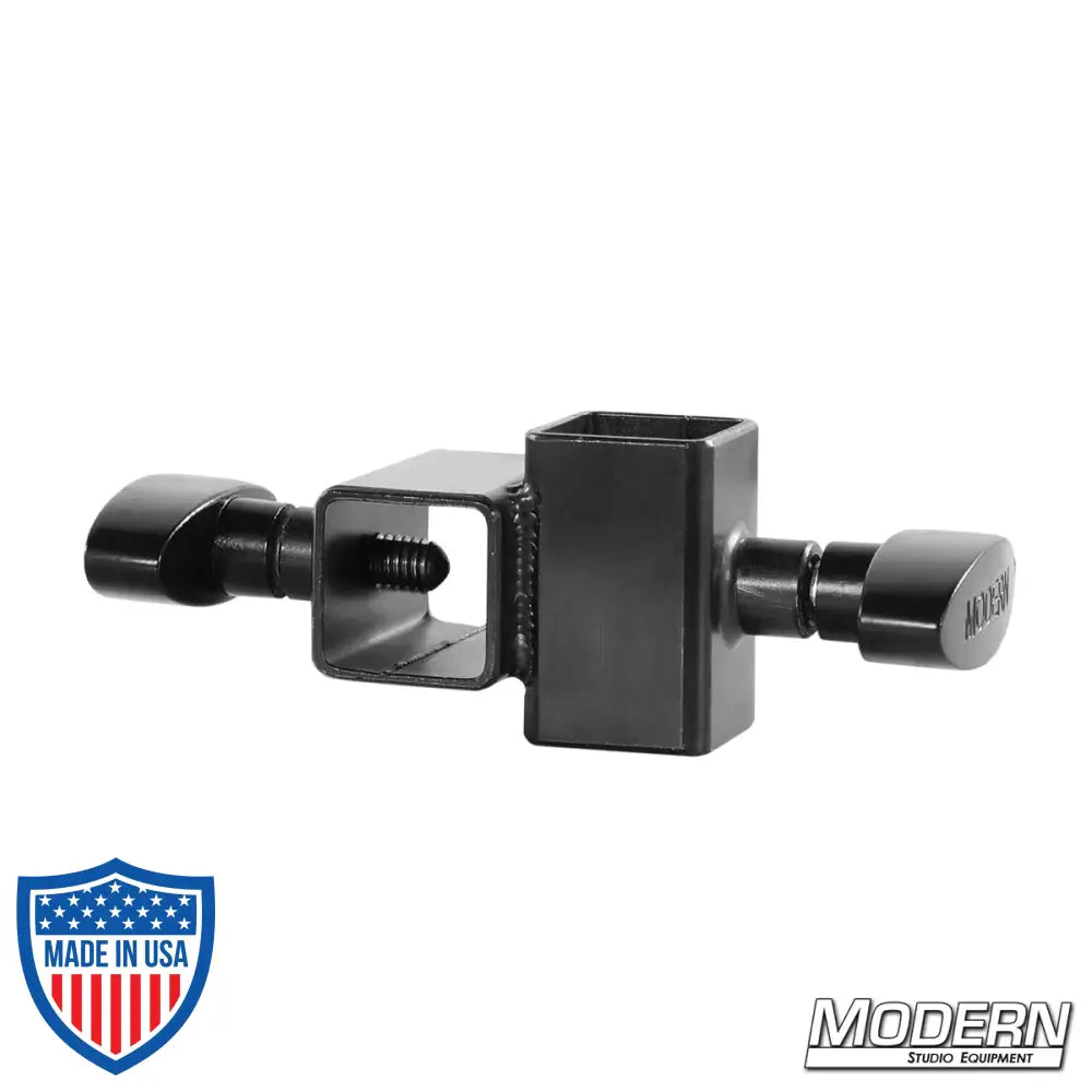 Mini Cross fitting for 1-inch square tube in black zinc with T-handles for film grip rigging, used to connect aluminum at 90-degree angle.