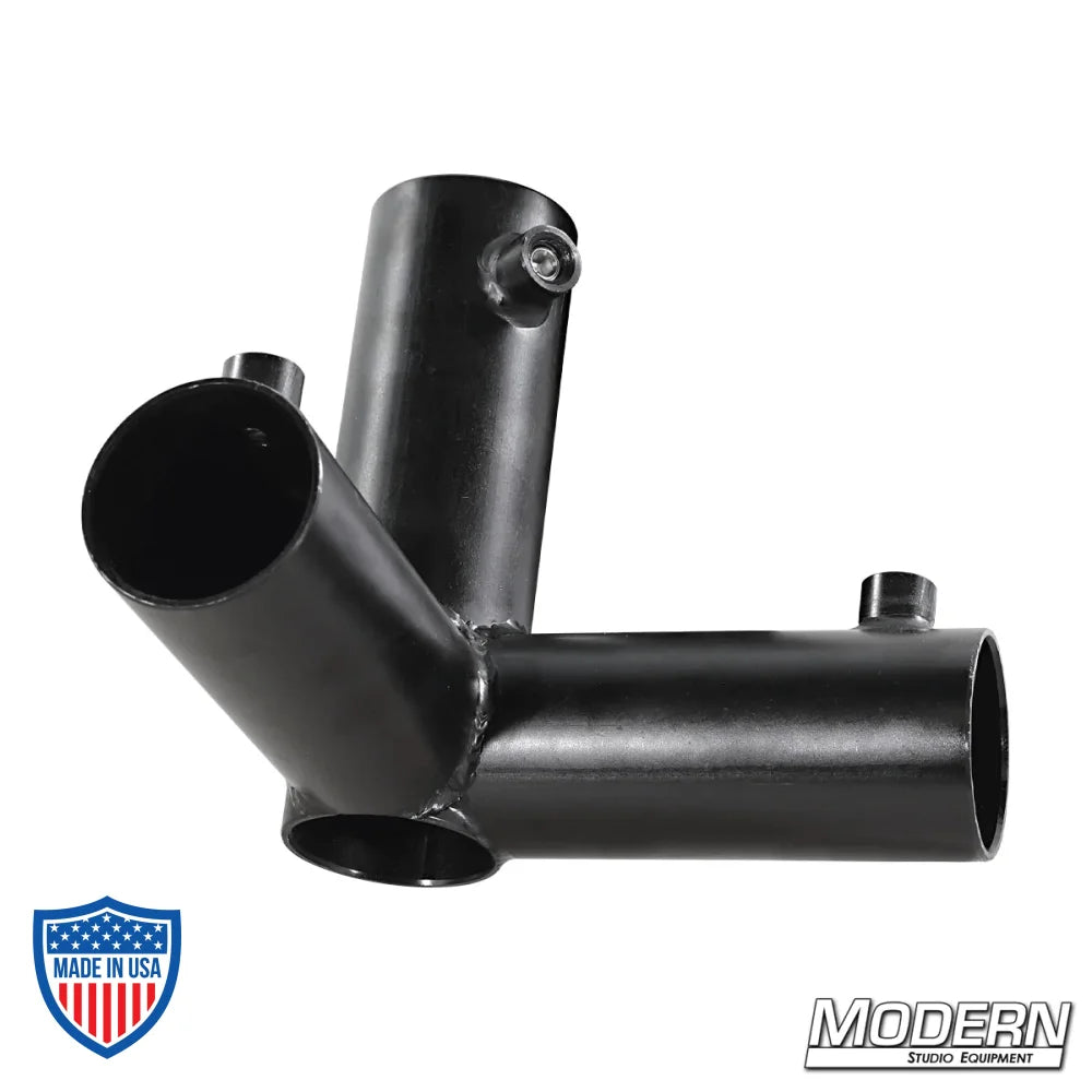 3-Way Pass Through Corner for 1-1/4" Speed-Rail® in black zinc with set screws for film grip and rigging applications.