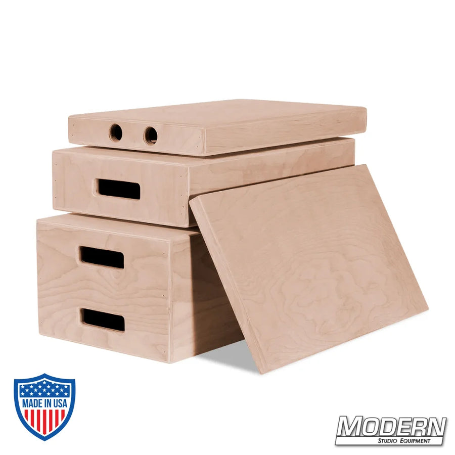 Apple box set for film rigging and grip, including full, half, quarter, and pancake sizes made of domestic and Baltic birch wood.