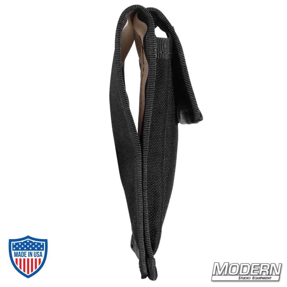 Black Best Boy Pouch for film grip rigging, made of durable cordura, holding a pen and notepad, perfect for studio equipment.
