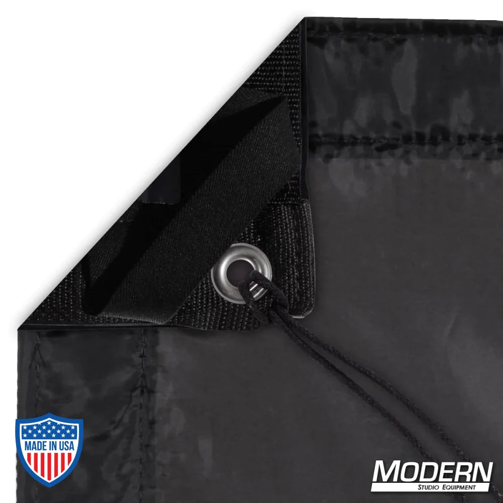 Corner view of Black Artificial Silk with grommet and tie, ideal for film grip and rigging, includes storage bag.