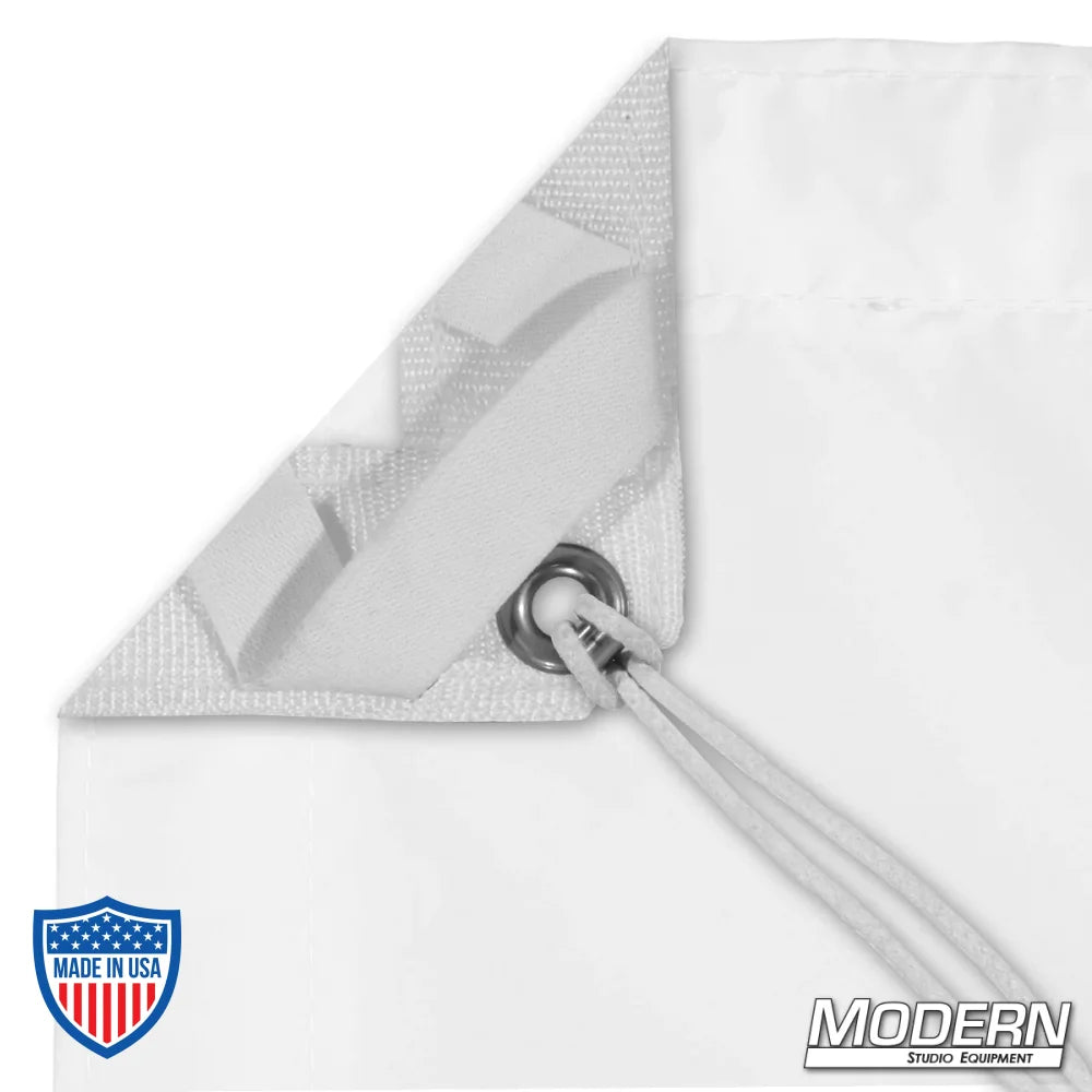 Heavy bleached muslin fabric with grommet and tie, used in film grip and rigging to diffuse light for even, soft illumination.