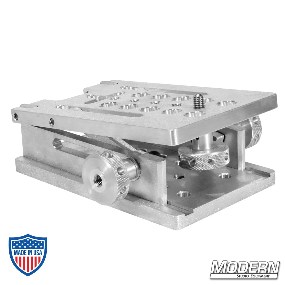 Camera wedge plate for film grip and rigging, made from 6061 aluminum with adjustable camera tie down knob.