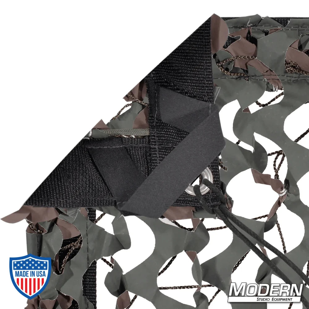 Camo net textile with webbing, grommets, ties, and elastic corners for film grip rigging, includes storage bag, Modern Studio Equipment logo