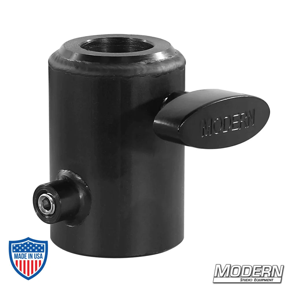 Black zinc candlestick maker fitting for film grip rigging tools integrating 1-1/2" Speed-Rail® to a 1-1/8" female receiver