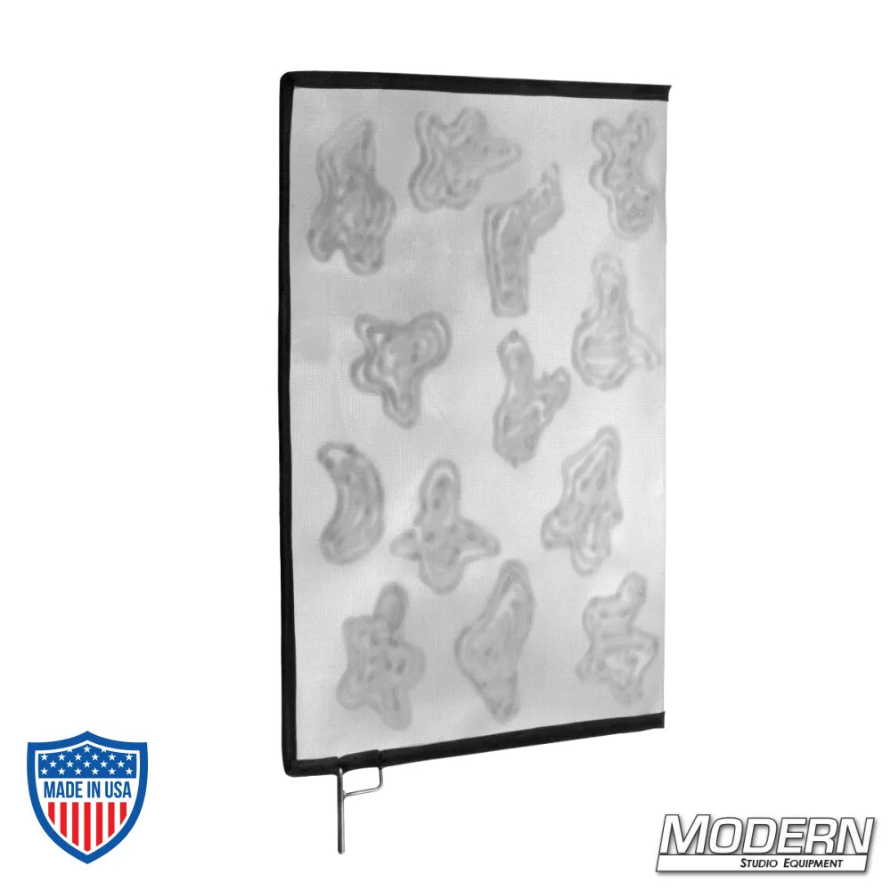 Celo Cucoloris screen glass with cucoloris pattern for creating shadow effects in film grip and rigging setups.