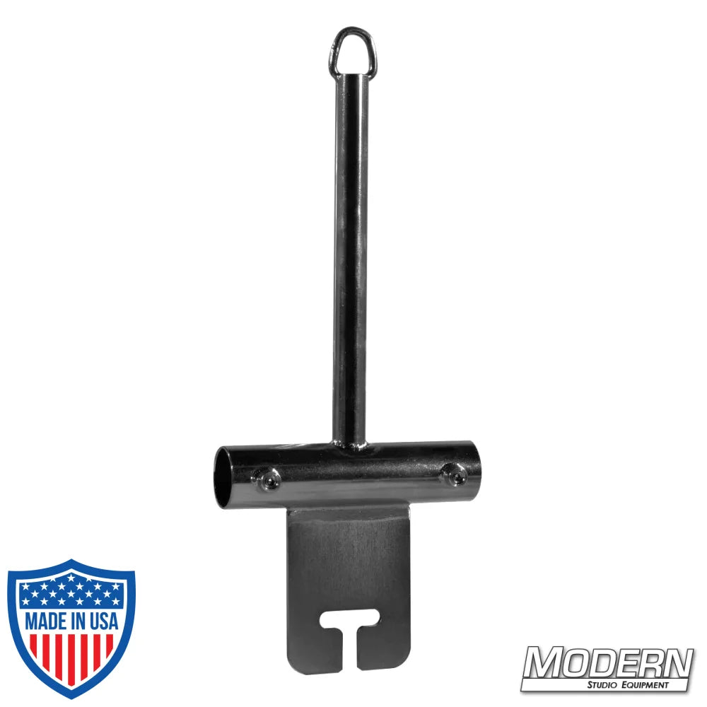 Center boom post with ear for 1-1/4-inch Speed-Rail® in black zinc finish used in film grip and rigging setups.